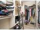 Walk-in closet with shelves, rods, and storage space for clothes and accessories at 2321 W Brookhart Way, Phoenix, AZ 85085