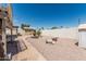 The backyard boasts decorative gravel, a charming fountain, flagstone walkway, and a wooden shed at 2723 N Winthrop --, Mesa, AZ 85213