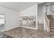 Bright entryway with tile flooring, staircase, and view into a spacious living area at 2723 N Winthrop --, Mesa, AZ 85213