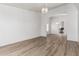 Bright and open living room featuring wood floors and a view into the kitchen at 2723 N Winthrop --, Mesa, AZ 85213