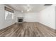 Spacious living room with wood floors, a fireplace, and a ceiling fan at 2723 N Winthrop --, Mesa, AZ 85213