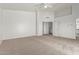 Large carpeted main bedroom with neutral walls and ceiling fan at 2723 N Winthrop --, Mesa, AZ 85213