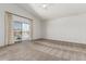 Spacious main bedroom features a balcony and ceiling fan at 2723 N Winthrop --, Mesa, AZ 85213