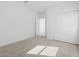 Spacious bedroom with carpet flooring, closet, and modern design at 37153 W Prado St, Maricopa, AZ 85138