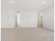 An open and airy living space featuring neutral paint, recessed lighting, and tile floors at 37153 W Prado St, Maricopa, AZ 85138