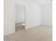 Bright room with neutral tile flooring at 37153 W Prado St, Maricopa, AZ 85138