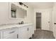 Bathroom with white vanity, marble countertop, and modern lighting fixtures at 379 E Cheyenne Rd, San Tan Valley, AZ 85143
