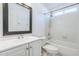Clean bathroom featuring a single sink vanity and a bathtub with shower at 3833 W Phelps Rd, Phoenix, AZ 85053