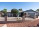 Charming single-story home featuring a private, enclosed front yard with a fountain at 3833 W Phelps Rd, Phoenix, AZ 85053