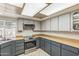This kitchen features modern appliances, stylish countertops and ample cabinet space for storage at 3833 W Phelps Rd, Phoenix, AZ 85053