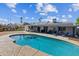 Sparkling pool with an extended patio, perfect for outdoor relaxation and entertainment at 3833 W Phelps Rd, Phoenix, AZ 85053