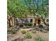 Well-maintained building with mature trees and shrubbery at 3935 E Rough Rider Rd # 1360, Phoenix, AZ 85050