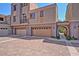 Spacious garages with driveway and meticulously maintained landscaping at 3935 E Rough Rider Rd # 1360, Phoenix, AZ 85050