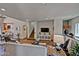 Inviting living room features hardwood floors, a fireplace, and a staircase leading to the upper level at 3935 E Rough Rider Rd # 1360, Phoenix, AZ 85050