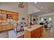 Spacious living room with an island bar for dining, a dining table, and a comfortable seating area at 3935 E Rough Rider Rd # 1360, Phoenix, AZ 85050