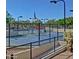 Community tennis courts with lighting and well-maintained playing surface at 3935 E Rough Rider Rd # 1360, Phoenix, AZ 85050