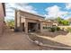 Backyard featuring a covered patio and low maintenance desert landscaping at 3964 E Hummingbird Ln, Phoenix, AZ 85050