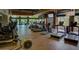 Gym with workout machines and televisions for entertainment and stone pillars at 3964 E Hummingbird Ln, Phoenix, AZ 85050