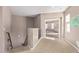 Hallway with carpet and access to bedrooms, stairs to the ground floor, and natural light at 3964 E Hummingbird Ln, Phoenix, AZ 85050