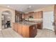Spacious kitchen with a large island and stainless steel appliances, perfect for cooking and entertaining at 3964 E Hummingbird Ln, Phoenix, AZ 85050