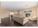 Bright and airy living room with hardwood floors, fireplace, and dining area, creating a welcoming space at 3964 E Hummingbird Ln, Phoenix, AZ 85050