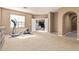 Bright and airy living room with a large window, perfect for exercise or relaxation at 3964 E Hummingbird Ln, Phoenix, AZ 85050