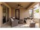 Outdoor patio with ceiling fan, furniture, and a view of the backyard at 3964 E Hummingbird Ln, Phoenix, AZ 85050