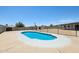 Refreshing backyard pool with secure fencing, a concrete surround, and ample space for outdoor relaxation and entertainment at 4117 W Camino Acequia Ave, Phoenix, AZ 85051