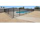 Private fenced pool offers a refreshing escape in the spacious backyard of this residence at 4117 W Camino Acequia Ave, Phoenix, AZ 85051