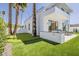 Backyard features a putting green, outdoor kitchen, dining area, and modern home design at 4120 N 44Th Pl, Phoenix, AZ 85018