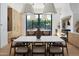 Dining room with pendant lighting, a large table, and seamless access to the gourmet kitchen at 4120 N 44Th Pl, Phoenix, AZ 85018