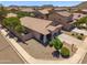 Aerial view showing the home's front, backyard, landscaping, and quiet street at 4553 W Kirkland Ave, San Tan Valley, AZ 85144