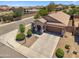 Aerial view of a tan single-story home with a two-car garage in a residential neighborhood at 4553 W Kirkland Ave, San Tan Valley, AZ 85144