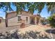 Expansive backyard with drought tolerant landscaping, brick paved patio and covered patio at 4553 W Kirkland Ave, San Tan Valley, AZ 85144