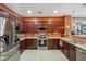 Large kitchen featuring stainless steel appliances and ample counter space at 4553 W Kirkland Ave, San Tan Valley, AZ 85144