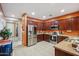 Well-equipped kitchen with stainless steel appliances and abundant cabinet storage space at 4553 W Kirkland Ave, San Tan Valley, AZ 85144