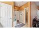 Beautiful bathroom with a glass-enclosed shower and ample storage space, and tile flooring for easy maintenance at 4553 W Kirkland Ave, San Tan Valley, AZ 85144