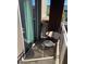 Cozy balcony features a small table and chairs, creating an inviting outdoor space for relaxation and enjoyment at 6605 N 93Rd Ave # 1071, Glendale, AZ 85305