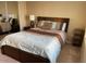 Comfortable bedroom featuring a large bed, soft bedding, and a mirrored closet at 6605 N 93Rd Ave # 1071, Glendale, AZ 85305