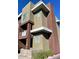 Multi-story townhome showcasing modern architecture and a private balcony, blending comfort and style in a desirable location at 6605 N 93Rd Ave # 1071, Glendale, AZ 85305