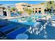 Resort-style pool area featuring lounge chairs and inviting ambiance, perfect for relaxation and leisure in a community setting at 6605 N 93Rd Ave # 1071, Glendale, AZ 85305
