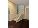 Carpeted staircase featuring a modern railing and neutral walls at 6605 N 93Rd Ave # 1071, Glendale, AZ 85305