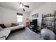 Cozy game room featuring a ceiling fan, TV, and entertainment setup for movies at 6713 S 76Th Dr, Laveen, AZ 85339