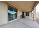 Covered patio features large sliding doors, perfect for indoor-outdoor entertaining, with ample seating space at 6713 S 76Th Dr, Laveen, AZ 85339