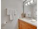 Modern bathroom with wood vanity, quartz countertop, and stylish accents, offering a clean and bright space at 7157 E Rancho Vista Dr # 2012, Scottsdale, AZ 85251