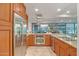 Well-equipped kitchen features stainless steel appliances and granite countertops, with an open view into the dining area at 7157 E Rancho Vista Dr # 2012, Scottsdale, AZ 85251
