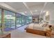 Modern main bedroom features floor-to-ceiling windows and plenty of natural light at 7157 E Rancho Vista Dr # 2012, Scottsdale, AZ 85251