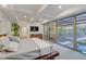 Modern main bedroom features floor-to-ceiling windows and plenty of natural light at 7157 E Rancho Vista Dr # 2012, Scottsdale, AZ 85251