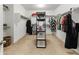 Spacious walk-in closet with shelving and ample storage space for clothing and accessories at 7180 W Tombstone Trl, Peoria, AZ 85383
