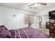 Comfortable bedroom with mirrored closet and ceiling fan to keep the room cool at 7317 S 37Th Gln, Phoenix, AZ 85041